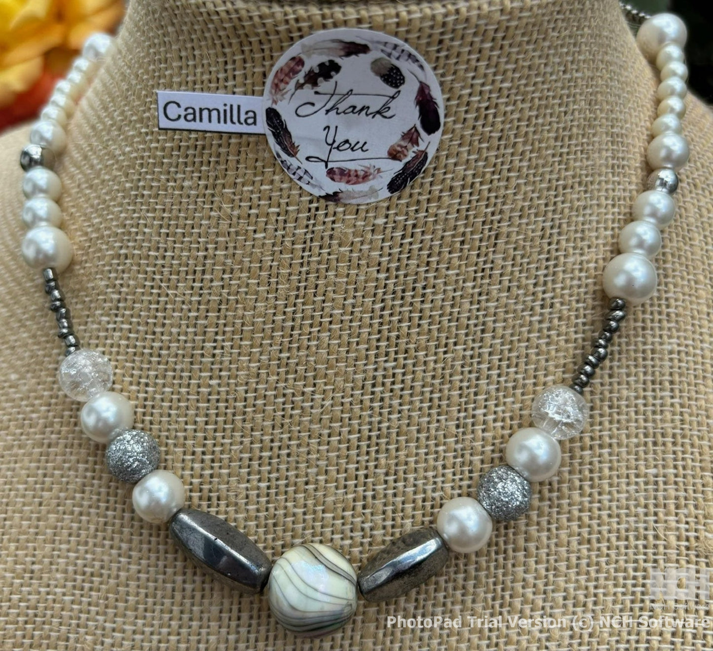 Camilla - Pearl Elegance: Timeless White Beaded Necklace, The silver beads and clasps add a touch of sophistication.