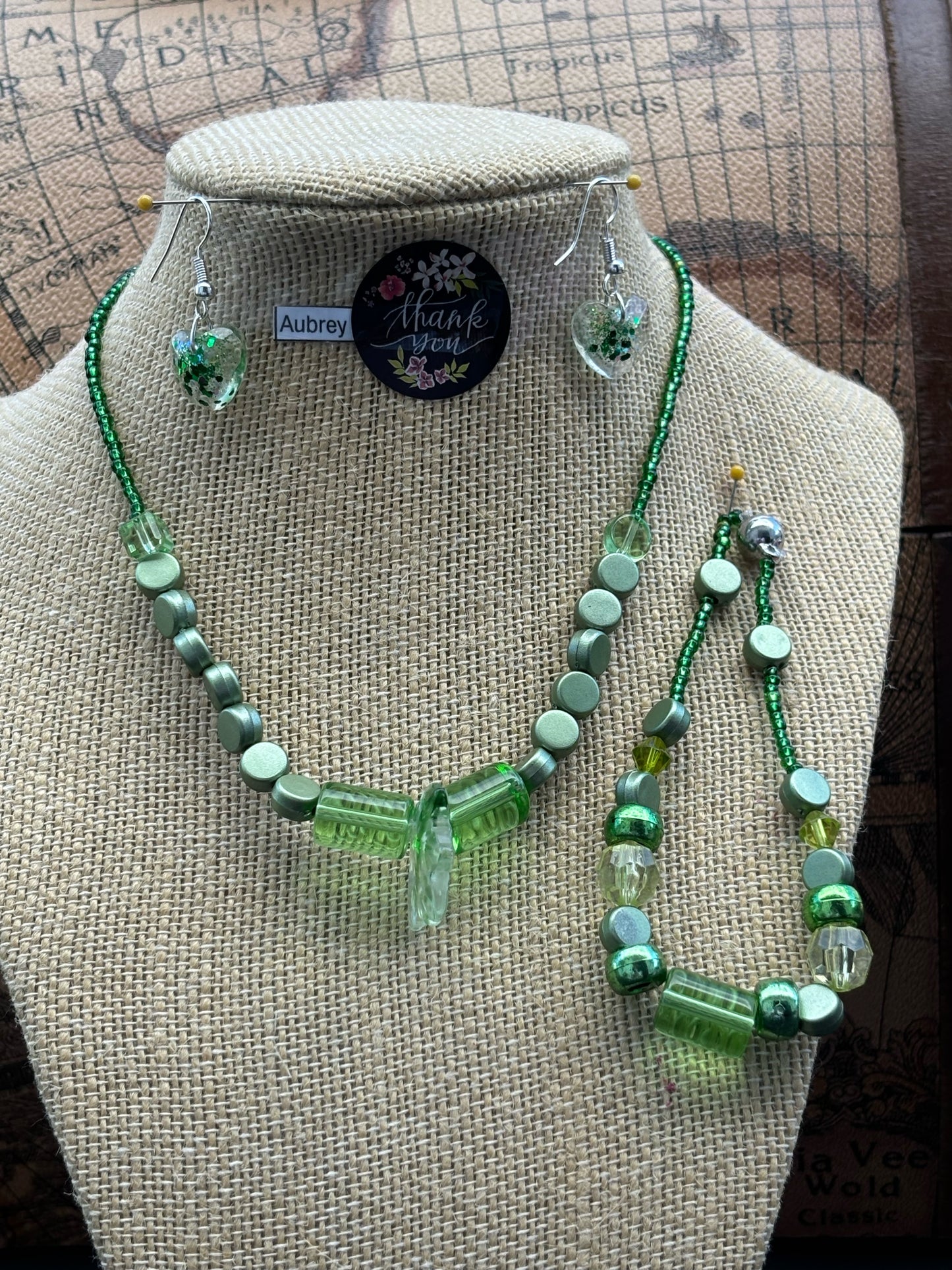 Aubrey - Emerald Elegance Stunning Green Beaded Necklace. Necklace showcases a beautiful array of greens, from deep forest to light lime.