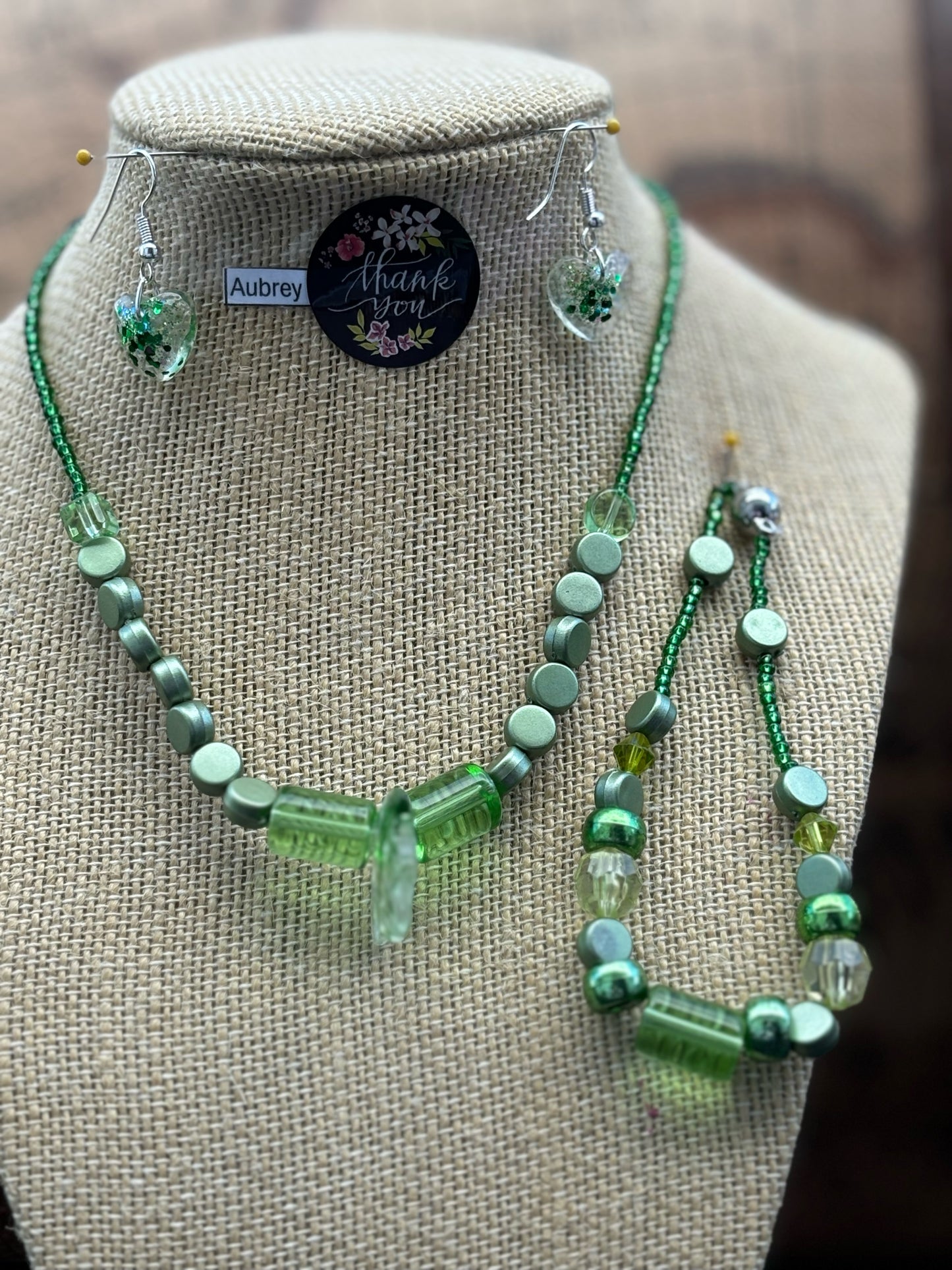 Aubrey - Emerald Elegance Stunning Green Beaded Necklace. Necklace showcases a beautiful array of greens, from deep forest to light lime.