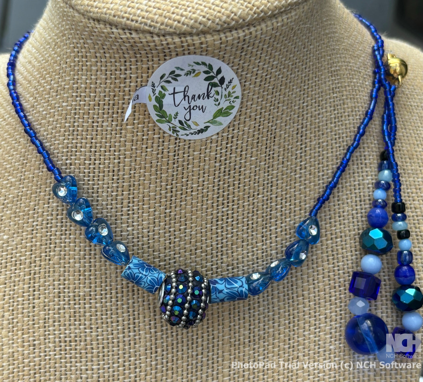 Julia - Sapphire Dreams Beaded the highlight of this necklace is the prominent pendant with intricate details  exquisite craftsmanship.
