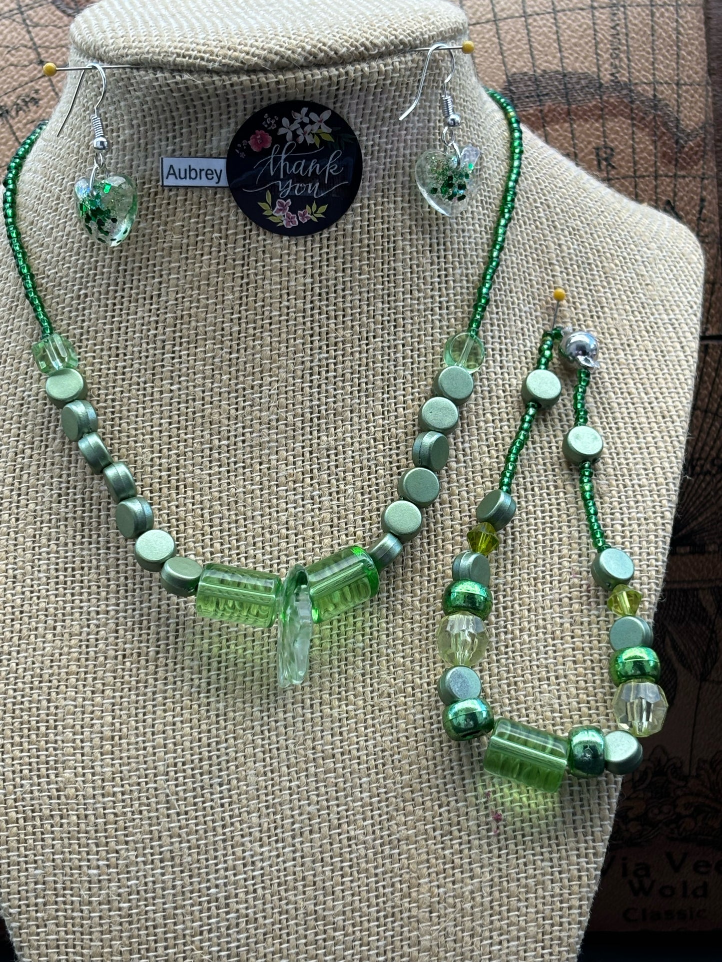 Aubrey - Emerald Elegance Stunning Green Beaded Necklace. Necklace showcases a beautiful array of greens, from deep forest to light lime.
