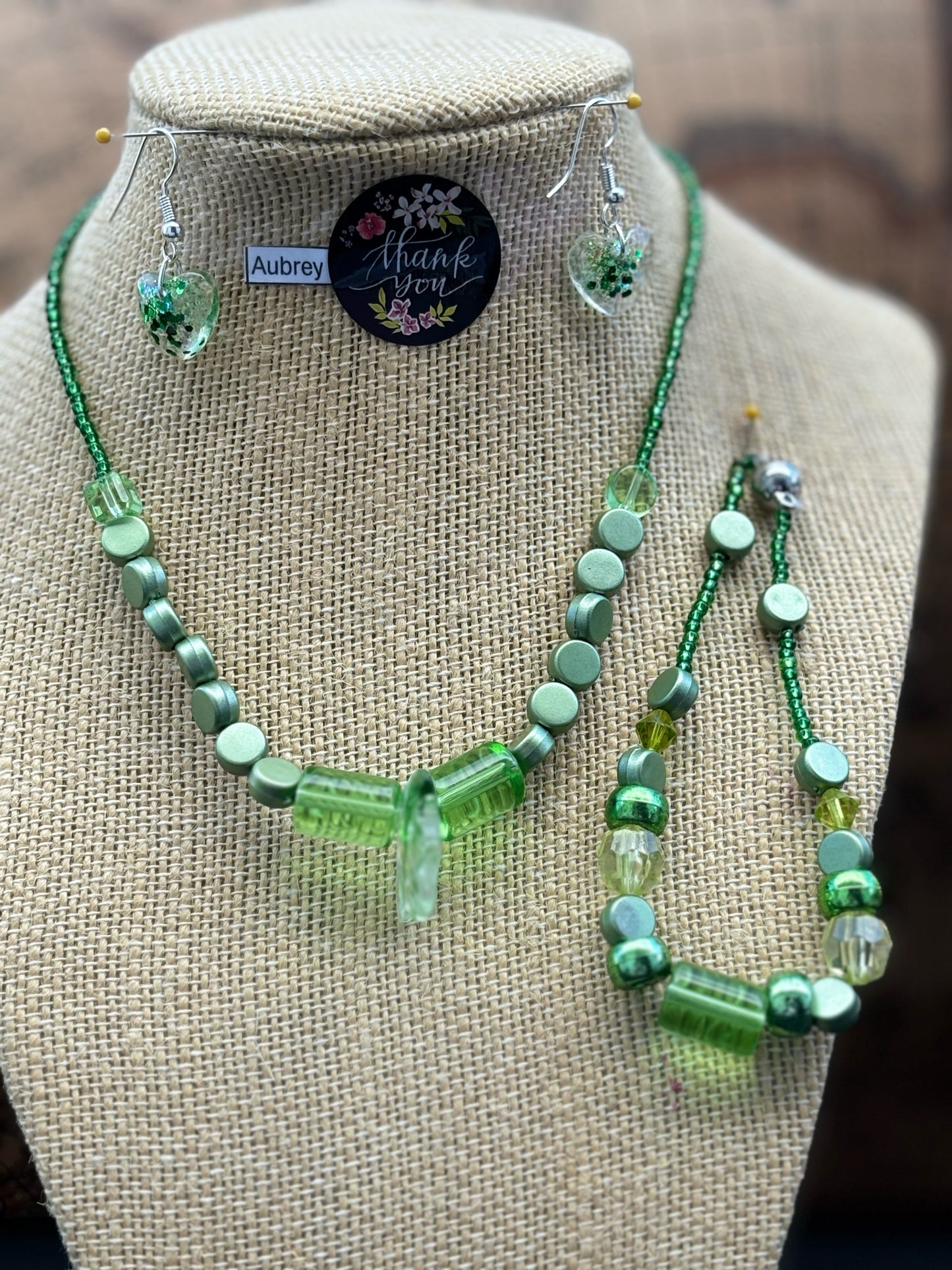 Aubrey - Emerald Elegance Stunning Green Beaded Necklace. Necklace showcases a beautiful array of greens, from deep forest to light lime.