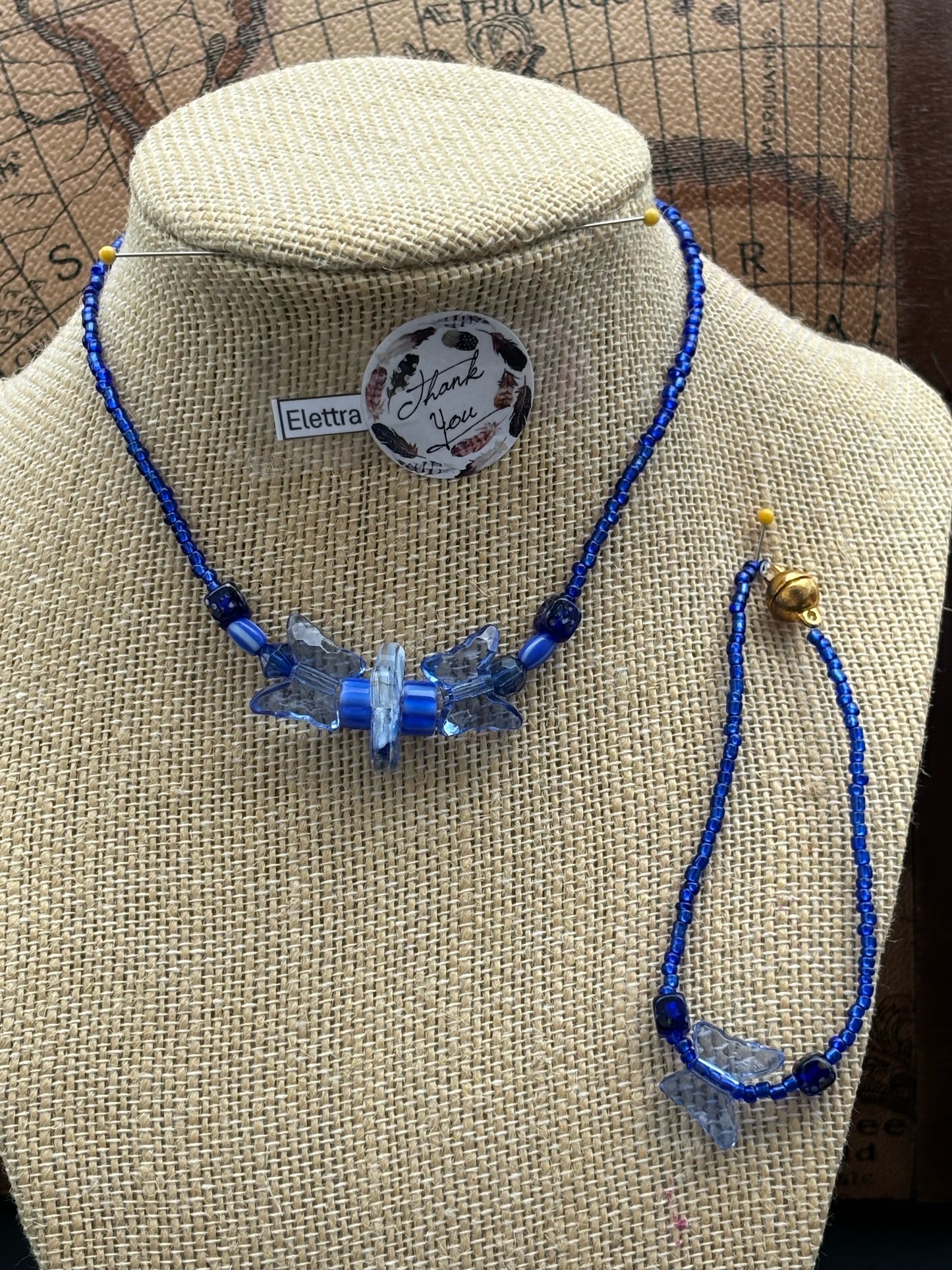 Elettra - Elegant Blue Beaded Necklace and Bracelet Set Kyanite is believed to help with stress relief, communication, and spiritual growth. It's said to align the chakras and promote a sense of calm and balance.